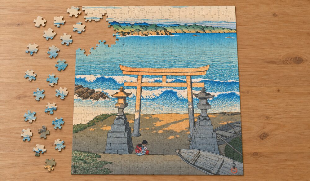 川瀬巴水「旅みやげ第三集 房州 太海」を絵柄にした、組み立て途中のジグソーパズルのイメージ