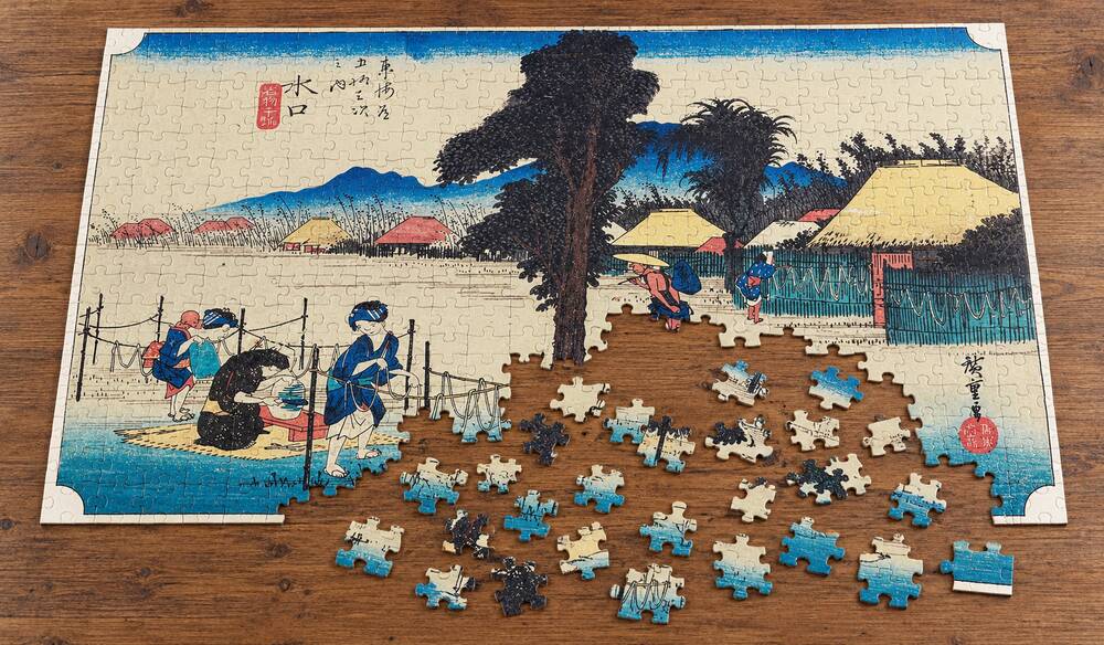 歌川広重「東海道五十三次 水口宿 名物干瓢」を絵柄にした、組み立て途中のジグソーパズルのイメージ