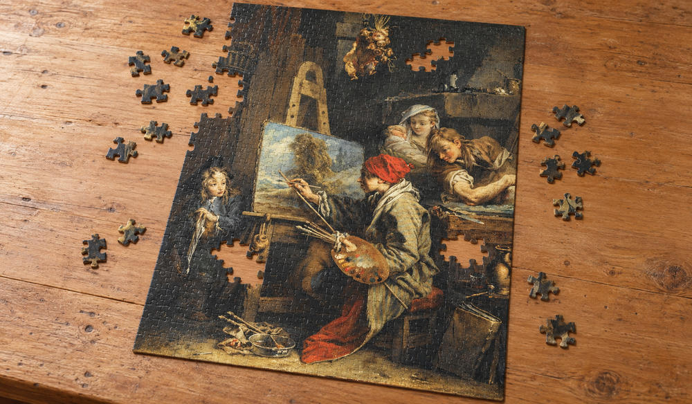 フランソワ・ブーシェ「風景画家」を絵柄にした、組み立て途中のジグソーパズルのイメージ