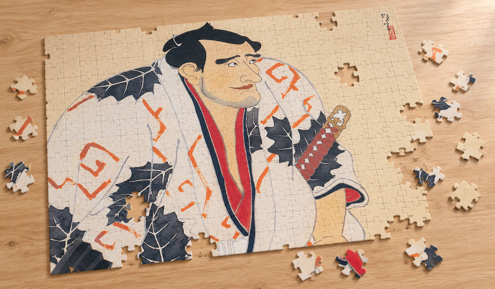 北野恒富「関取」を絵柄にした、組み立て途中のジグソーパズルのイメージ