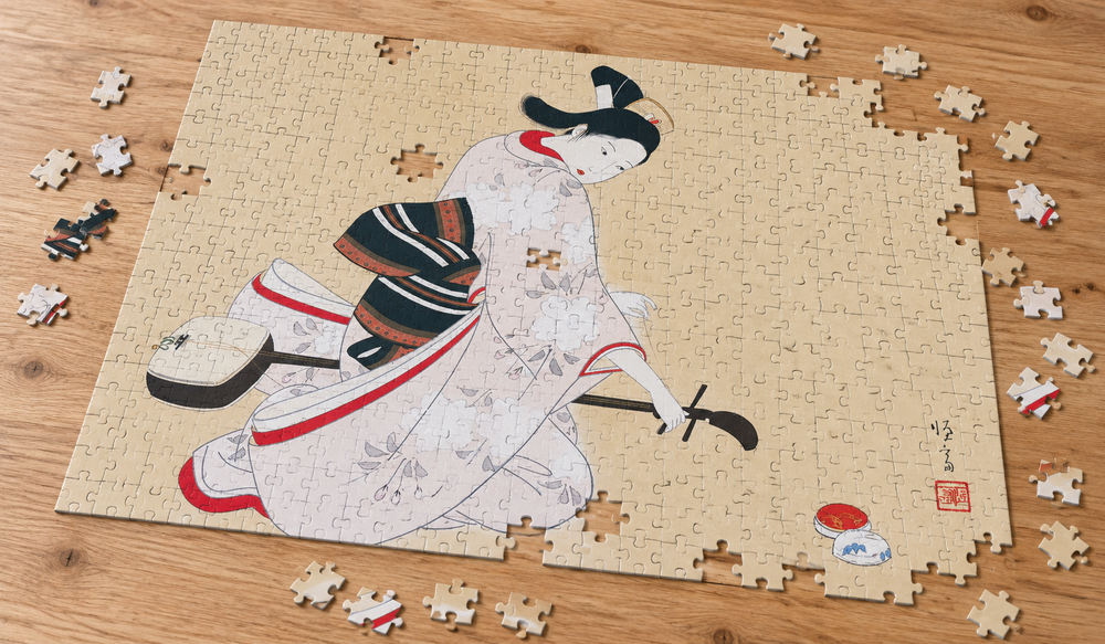 北野恒富「三味線」を絵柄にした、組み立て途中のジグソーパズルのイメージ