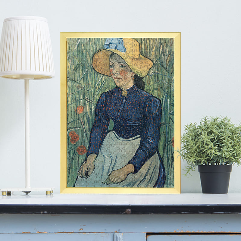 麦畑の前に座る麦わら帽子をかぶった若い農民の少女（フィンセント・ファン・ゴッホ）