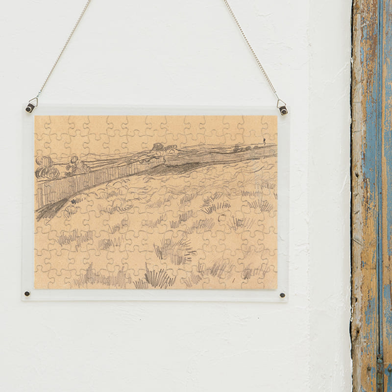 「サン・レミ・ド・プロヴァンスにある聖パウロ精神病院の裏手の野原の眺め（フィンセント・ファン・ゴッホ）」パズルをインテリアとして飾る