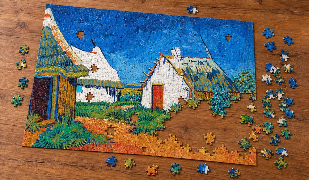 ゴッホ「サントマリーにある3軒の白いコテージ」の組み立て途中を表したアートパズルのイメージ