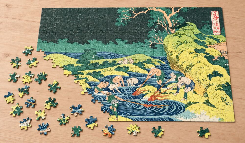 北斎「千絵の海 甲州火振」の組み立て途中を表したアートパズルのイメージ